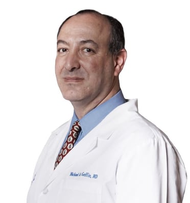 head shot of Dr. Michael Geffin, a white male doctor wearing a white lab coat