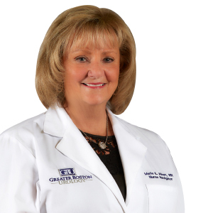 head shot of nurse navigator Marie Albert, a white woman with shoulder-length blonde hair