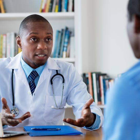 Doctor talking to patient.